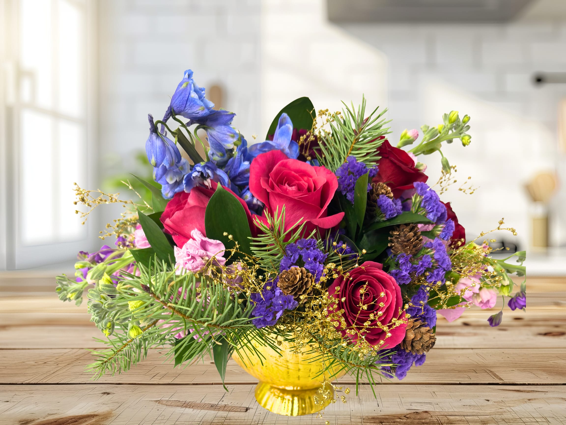 Advent Collection Golden Compote - Our luxurious holiday collection featuring lush premium jewel toned florals. This arrangement is designed in a beautiful gold metal compote. 