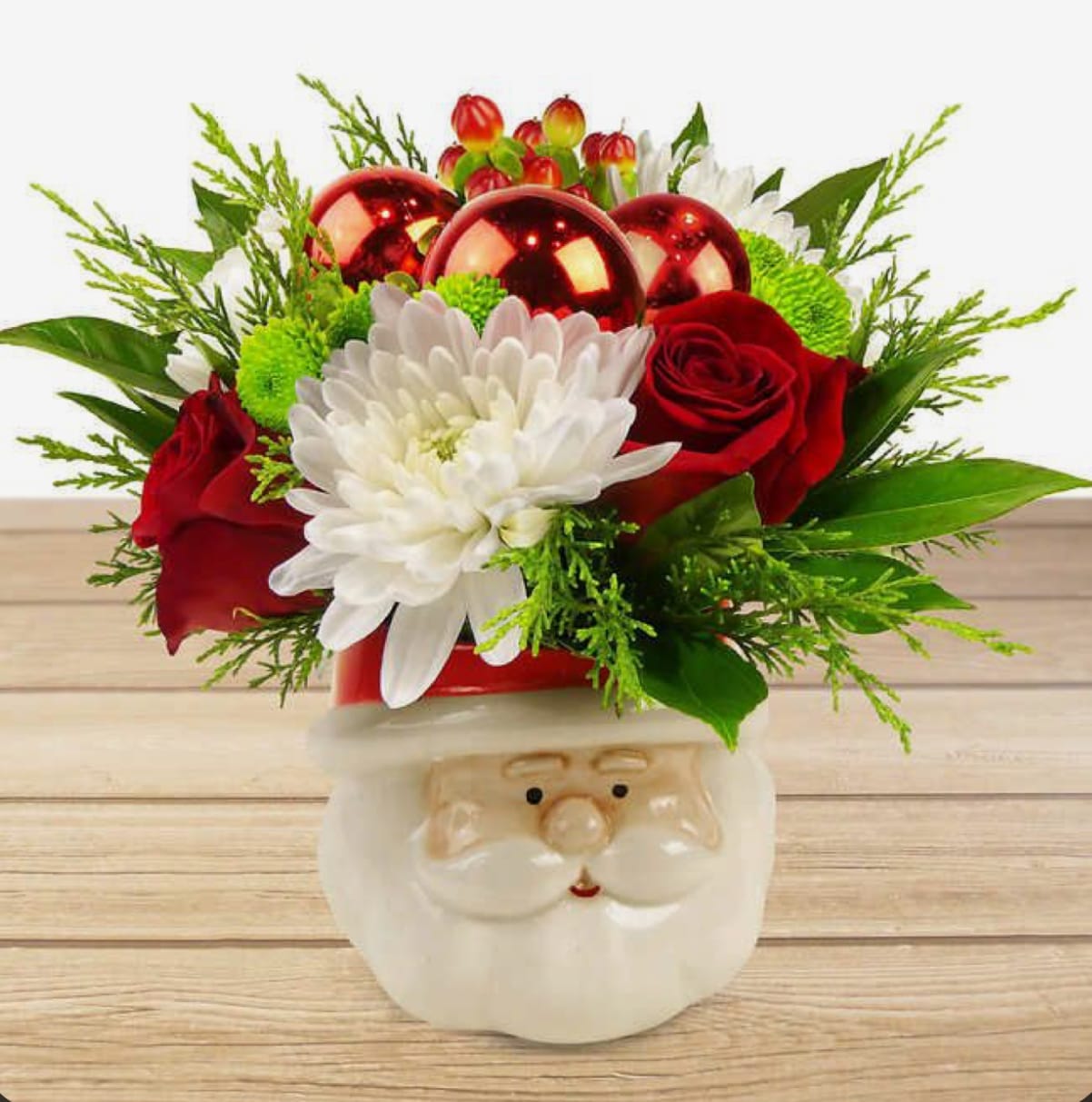 Santa Mug Arrangement - Arrangement in a santa mug. 