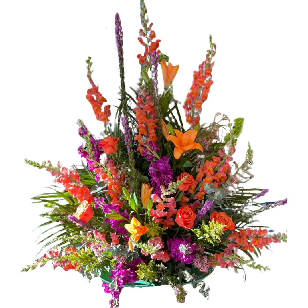 Vibrant Life - The contrast of purple and orange in this elegant design makes for a stunning tribute.  For funeral arrangements like this, it is highly recommended to order at least 2 days in advance of the funeral in order to ensure availability of desired flowers/product.