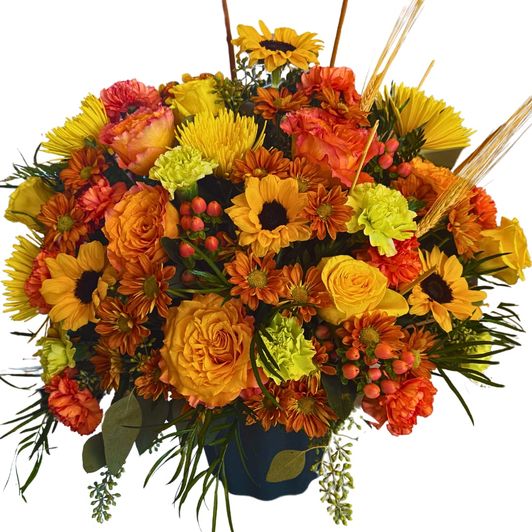 Heartfelt Remembrance  - Brighten a difficult time with the warm, comforting colors of the Heartfelt Rememberance Sympathy Arrangement. This large and elegant display features a stunning blend of sunflowers, roses, carnations, mums, and fresh greenery, thoughtfully designed to convey heartfelt condolences. Perfect for honoring the memory of a loved one, this arrangement&#039;s golden hues symbolize the lasting impact they’ve left on the hearts of those who loved them. Hand-delivered with care, this radiant arrangement serves as a beautiful tribute and a source of comfort during times of loss.