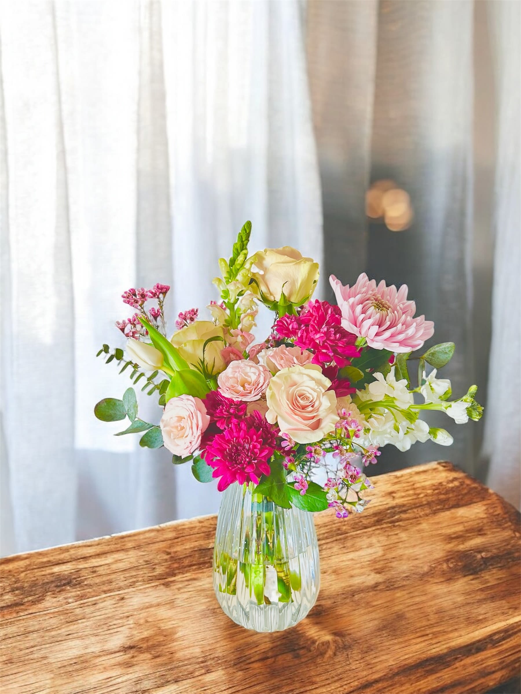 Perfect match  - Bouquet in a ribbed vase. We make a hand-tied bouquet and put it in a vase for you.    Please keep in kind that no arrangement can be made identical to the photos shown (as some flowers are seasonal). Therefore, we will substitute them accordingly with in-season flowers instead. We will do our absolute best to arrange the flowers as similar as possible with the photos shown!   For Bouquets, we DO NOT include vases unless you add one.  For Vased Flowers, we include vases.   Right now, you can expect summer blooms sourced from local farms.   We use small ordinary 4in by 3in cards. If you want to send flowers with a special messaging card, please choose one from add-ons!  Delivery: our standard delivery time window is between 3:00pm and 5:00pm.   If you have any questions regarding the order, please feel free to contact us!   Email: agapeflower.studio25@gmail.com