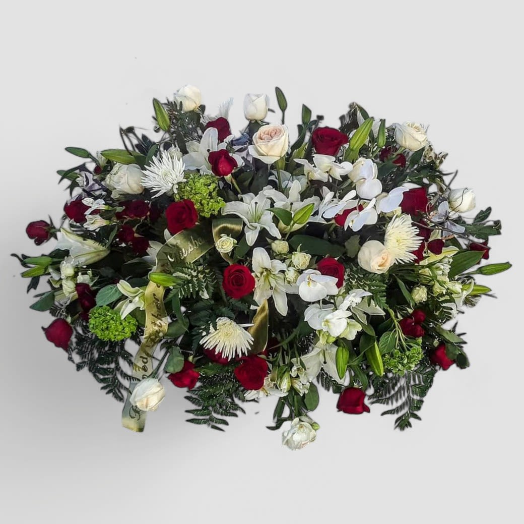 Forever In My Heart Red &amp; White Casket Spray - Roses, Hydrangeas &amp; Lilies - Honor a loved one's memory with our Forever in My Heart Red &amp; White Casket Spray, timeless tribute of beauty and love. Elegant red roses, pure white lilies, and lush hydrangeas are gracefully arranged to drape the casket with serenity and respect. Perfect for funeral services in Haddonfield, Haddon Township, Cherry Hill, and surrounding areas, this design symbolizes everlasting love and heartfelt remembrance. Handcrafted by our expert florists, each spray is a one-of-a-kind expression of sympathy, thoughtfully delivered to the funeral home or service. Please allow 48 hours for premium blooms to arrive fresh from the market.