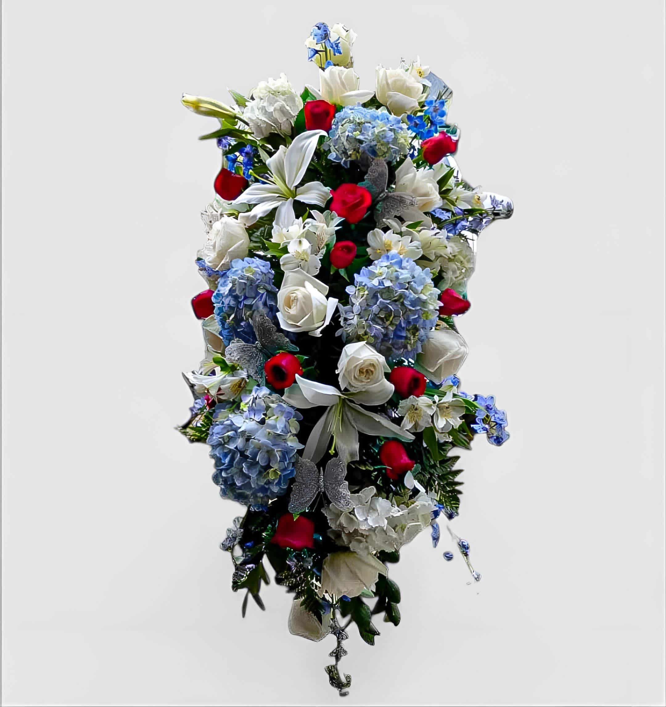 Patriotic Honor Standing Spray - Red Roses, White Roses &amp; blue Hydrangeas - Celebrate a life of courage and honor with our Patriotic Honor Standing Spray, featuring bold red roses, pristine white roses, and striking blue hydrangeas. This elegant sympathy spray is handcrafted by our expert florists to reflect strength, respect, and remembrance. Perfect for honoring veterans, service members, or loved ones who cherished their country, this red, white, and blue funeral standing spray offers a beautiful symbol of devotion and pride. Available for delivery to funeral homes and memorial services in Haddonfield, Haddon Township, Cherry Hill, and surrounding areas, this design brings heartfelt comfort and tribute.
