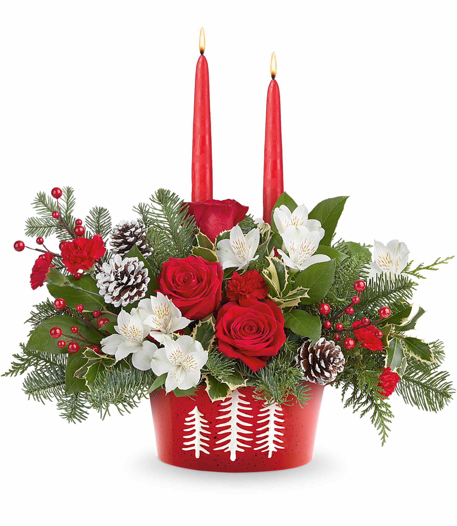 Evergreen Charm Centerpiece - Glow up your holiday table with our Evergreen Charm Centerpiece. Red roses, white alstroemeria, and evergreens shine in our Snowy Pines Dish with glowing red candles-perfect for Christmas dinners or winter celebrations.