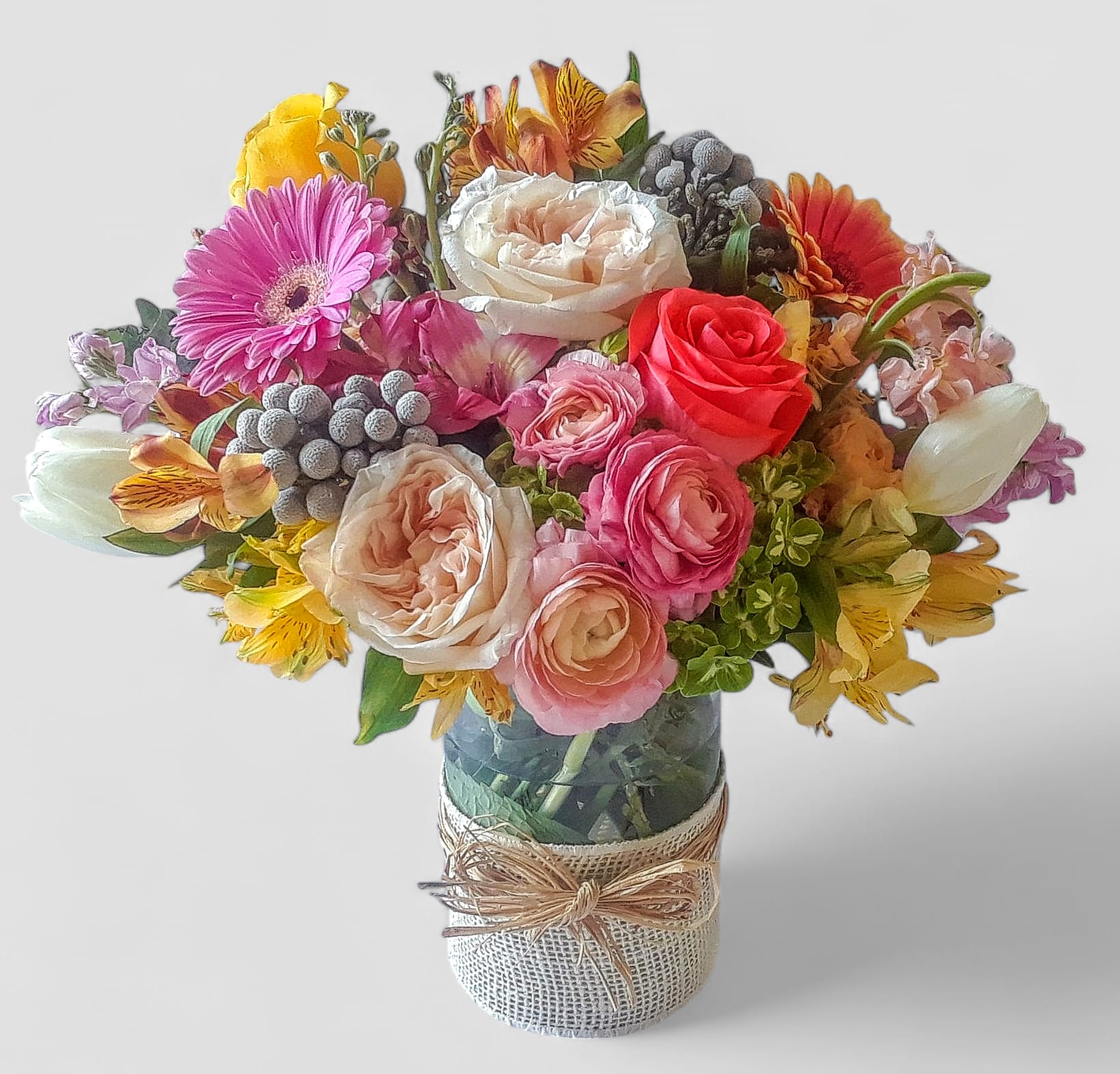 The Ultimate Flowers Beauty Designer's Choice - Send this beauty today to show them how much you care with it's soft and feminine color blossoms of that day roses orchids and more arranged in a tall modern glass cylinder vase wrapped in white jute ribbon. Stunning. All fresh flower bouquets that leave my flower shop studio are works of art. Please visit my beautiful gallery to see my latest designs that I have created for my online customers. Send them a special bouquet to make them smile today.