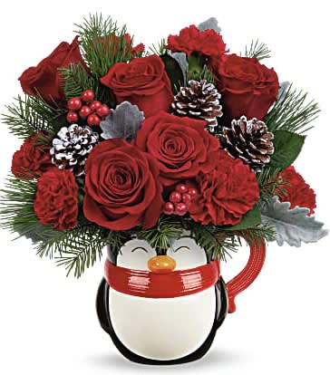 Send A Hug® North Pole Penguin - Bursting with Christmas blooms, this perky penguin is delighted to deliver your best wishes for a happy holiday season! The glazed ceramic mug is food-safe for sipping fun. 