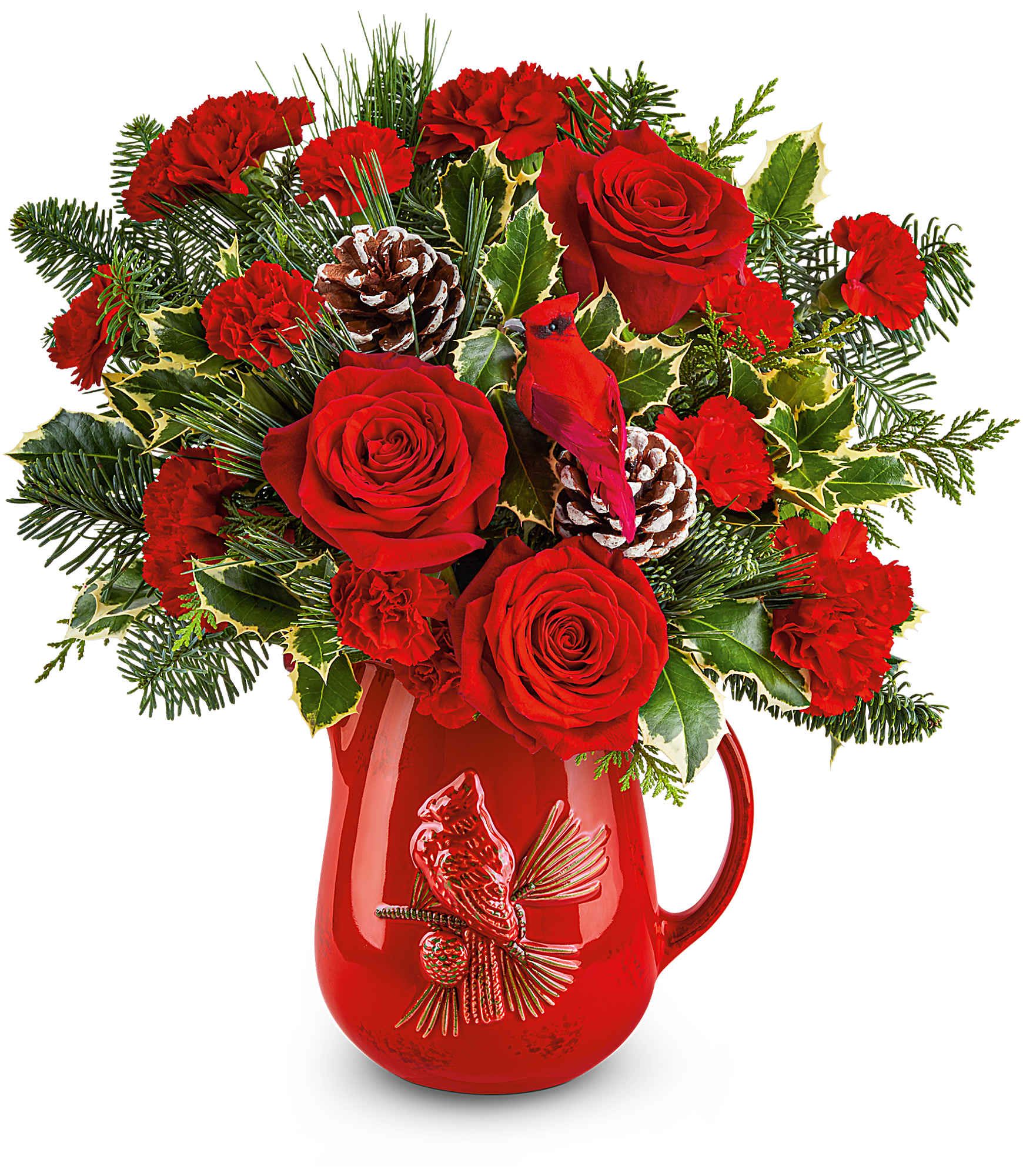 Scarlet Melody Bouquet - Scarlet Melody Bouquet hits a high note with bold red carnations and festive evergreens in a beautiful Scarlet Pitcher. A charming gift or centerpiece that sings with holiday spirit.