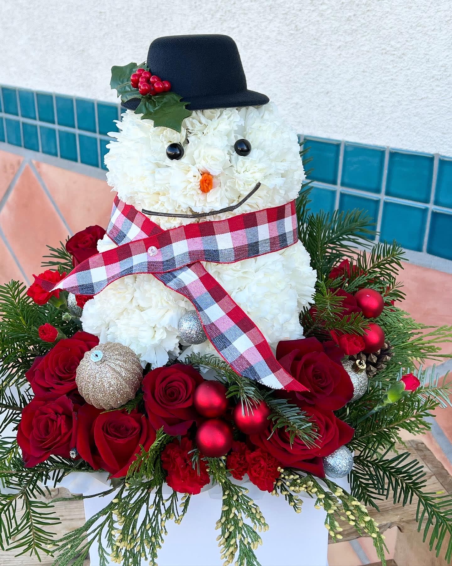 Frosty Snowman - A festive cute and fun flower arrangement for this winter. 