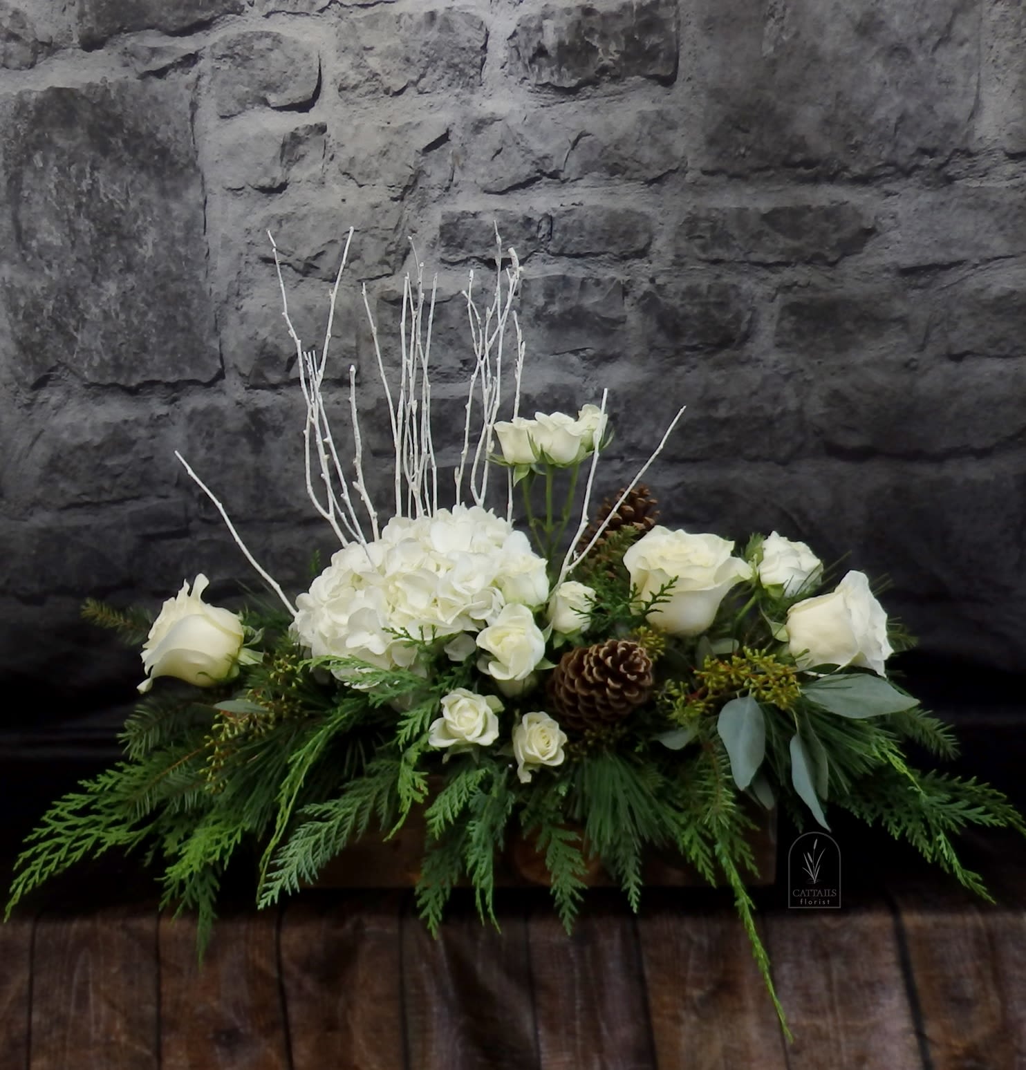 Winter Forest - Smaller version of  &quot;White Christmas&quot;. Beautiful, Natural, Woodsy theme in a wooden box with all white flowers. Hydrangea, Spray Roses, Roses, Pinecones, and White Birch Branches. 
