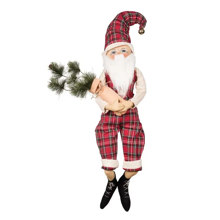 Paxton Santa - In addition to working with the elves on gifts for good boys and girls, Paxton Santa loves to spend time caring for the North Pole's Christmas trees (grown in Santa's greenhouse of course). Whimsically wonderful, this uniquely handcrafted art doll from Joe Spencer's Gathered Traditions' collection will bring a touch of fun to your home during the Christmas season. Dimensions: 8 x 7 x 32 in (20.3 x 17.8 x 81.3 cm)