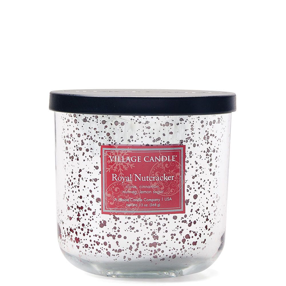 Village Candle Royal Nutcracker  - An ode to the grandeur of stoic nutcrackers atop the mantle, this holiday candle will fill you with childlike joy as notes of clove, cinnamon, nutmeg and lemon sugar spring to life with every light. Based on one of our best-selling scents, it comes in a glimmering silver jar inspired by vintage mercury glass that feels right at home with existing décor.  Crafted with food-grade paraffin wax for a clean, even burn Features lead-free, hand-trimmed cotton wicks Proudly manufactured and poured in Maine Fragrance Notes:  Top: Iced Lemon, Orange, Cinnamon Mid: Heliotrope, Vanilla Orchid, Clove, Nutmeg Base: Vanilla, Musk, Birch
