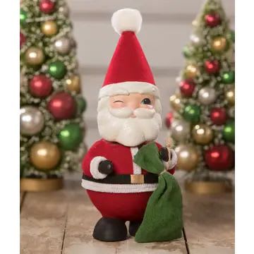 Santa Bobble Head Container - Capture the essence of a Retro Christmas with this delightful, winking Santa that opens up to hold a special gift or candy! Features red flocking, chenille trim, and green fabric bag. Dimensions 10 In H X 4.25 In W X 4 In D