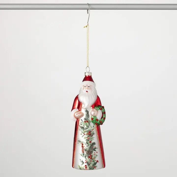 Retro Santa Ornament - This vintage-inspired Santa ornament brings timeless holiday charm to your decor. Crafted from iridescent material that catches the light, Santa's cloak shimmers with hints of red, green, and gold. Intricate holly embroidery adorns his suit, adding a touch of rustic character. Exclusive to Sullivan's Home Decor, this unique retro Santa figurine makes the perfect addition to your mantel, tree, or tablescape. -Dimensions: 3&quot;L x2.5&quot;W x8.5&quot;