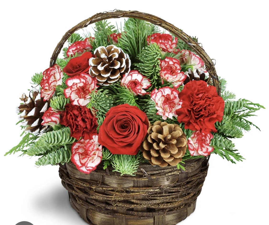 Basket Full of Christmastime  - Capture the magic of Christmas with this holiday inspired basket full bright, festive blooms