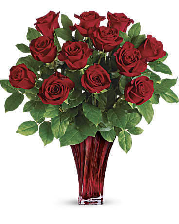  The Legendary Bouquet - This bouquet your can choice  of one dozen, 16, or 24  red roses .Thoughtfully arranged in a gorgeous blown-glass vase, it's the stuff legends are made of.