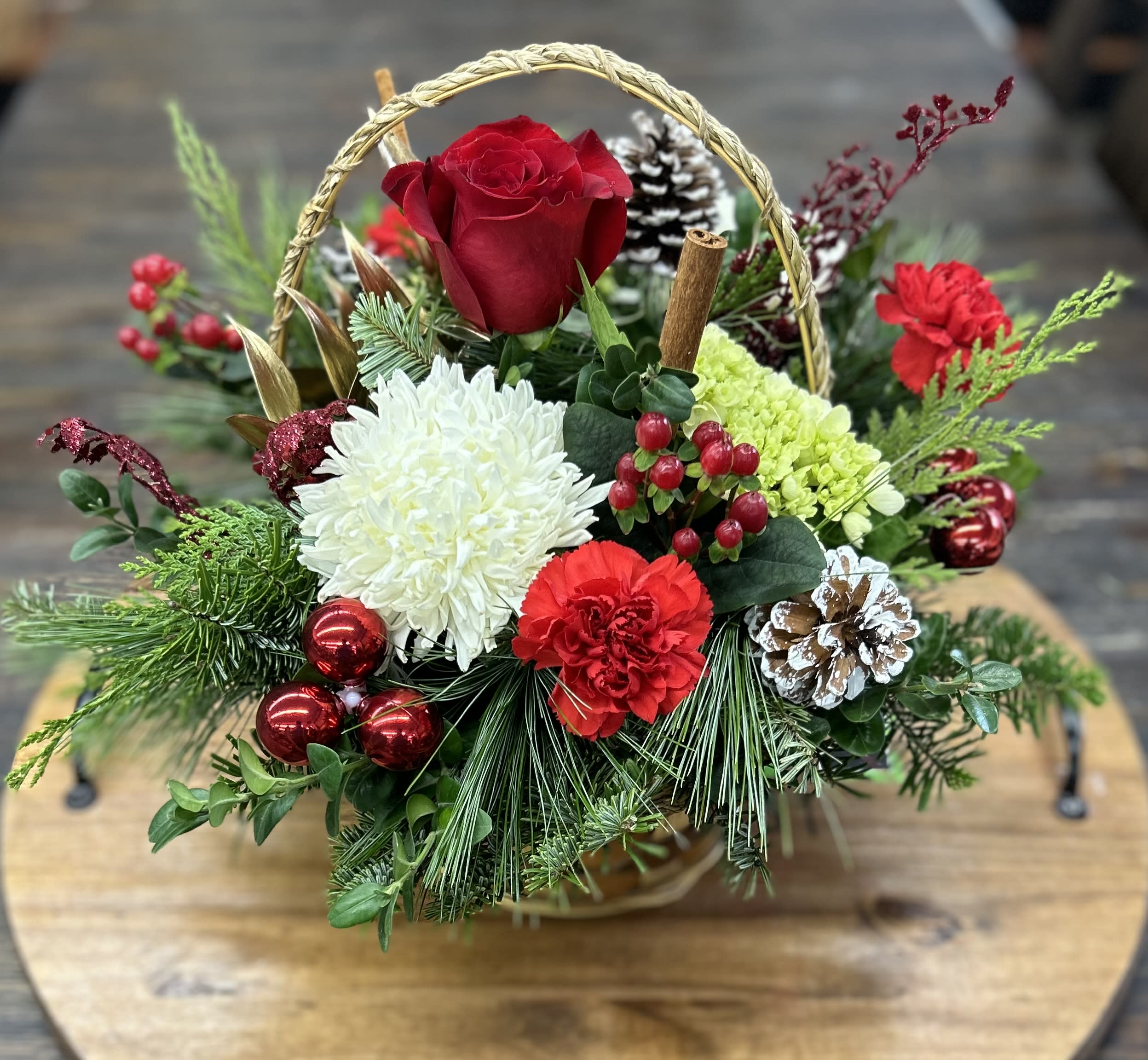Holiday Basket - Beautiful wicker basket full of fresh holiday greens and flowers