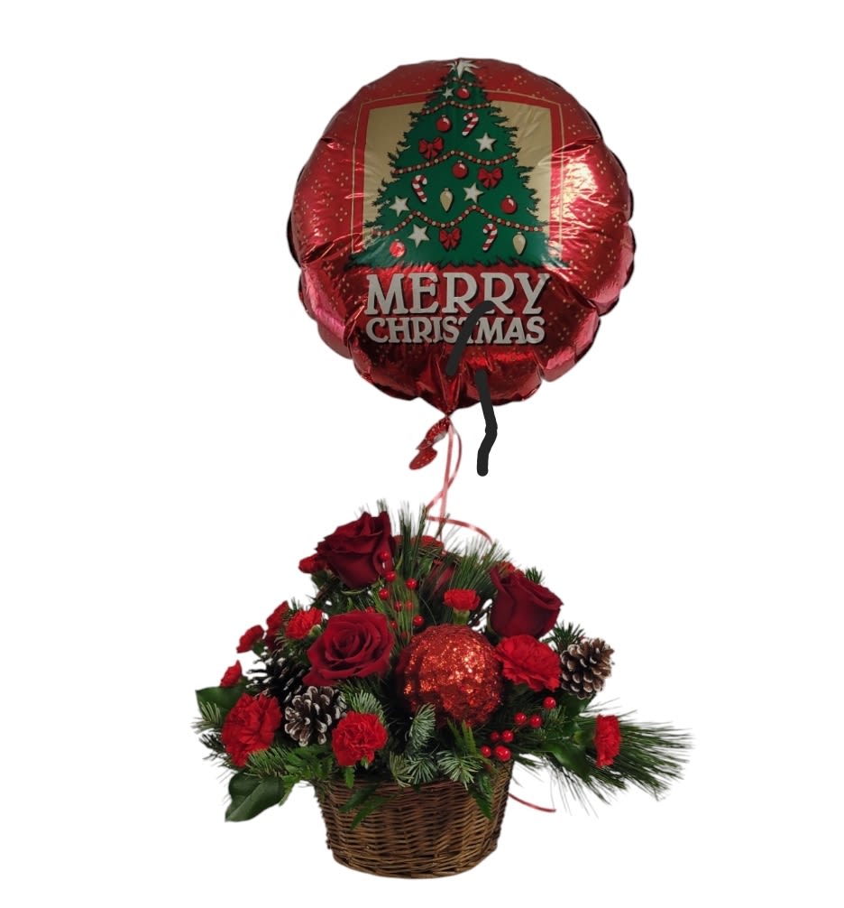 Christmas Basket - A Holiday design of all red flowers and evergreens design is a wicker basket with a Merry Christmas balloon attached!
