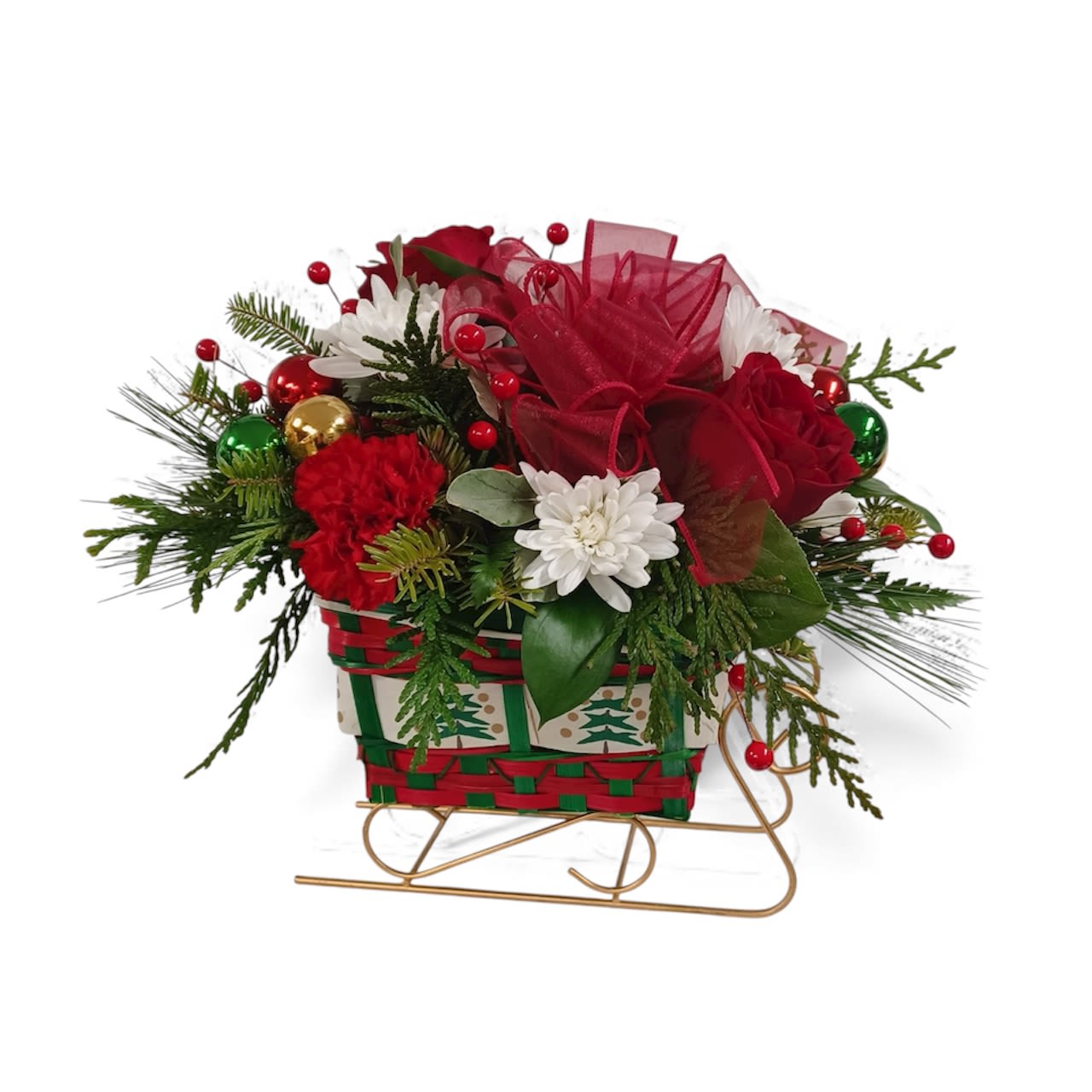 Sleigh Ride - The sleigh is wicker and filled with seasonal flowers in red and white; winter greens with holiday balls and berries. 
