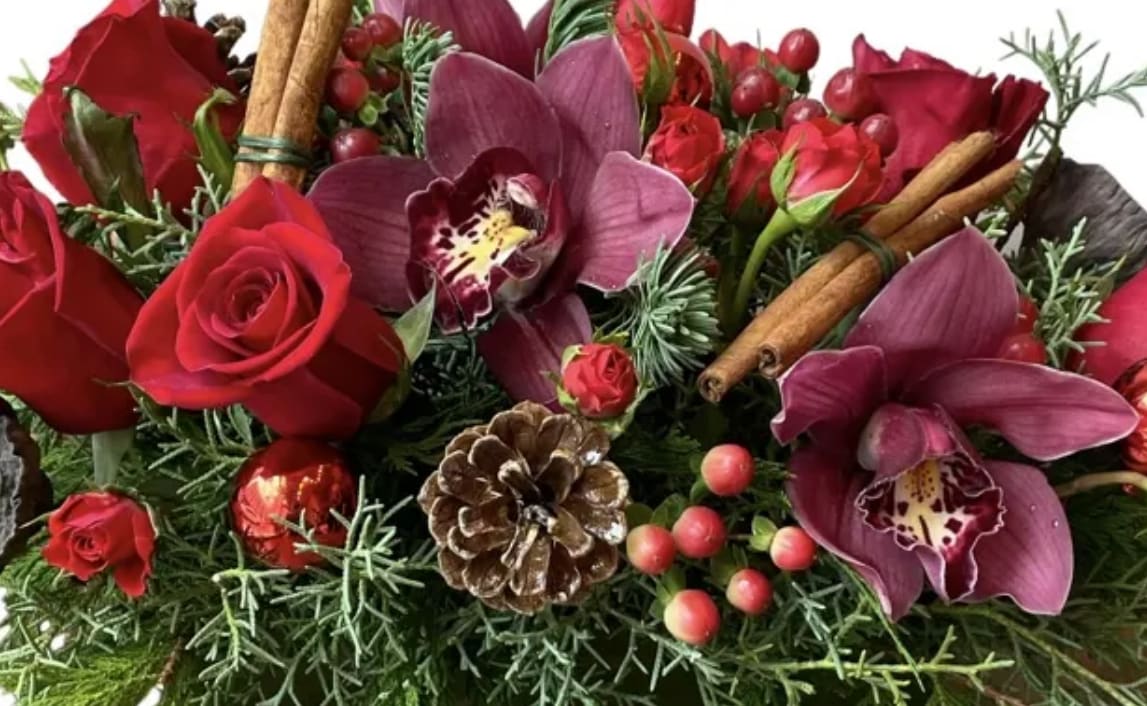 Christmas Designers Choice Arrangement  - Allow our designers to think outside the box and create a one of a kind arrangement! Our bestselling option! This arrangement allows us to use specialty stems that are not used/seen every day and are not in our stock photos. How exciting?!   We can’t wait to create for you! 