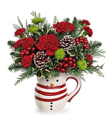 ** BEST SELLER**Send A Hug Sweet Frosty Bouquet - Whether filled with festive flowers at Christmas or hot cocoa in the New Year, this smiling ceramic snowman mug spreads whimsical winter cheer. Red carnations, miniature red carnations and green button spray chrysanthemums are arranged with noble fir, cedar and variegated holly. Delivered in SnowMan Frosty Mug *** MUG DESIGN WILL VARY ***