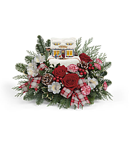 TF Thomas Kinkade's Festive Fudge Shoppe Bouquet 2022 - Give the gift of a winter wonderland with this charming Kinkade collectible, complete with glowing windows, hand-painted details and a festive bouquet.  This bouquet includes red roses, white alstroemeria, miniature peppermint carnations, white limonium, variegated holly, noble fir and cedar. Delivered with Teleflora's Thomas Kinkade's Sweet Shoppe Keepsake. Approximately 17 3/4&quot; W x 11 1/2&quot; H