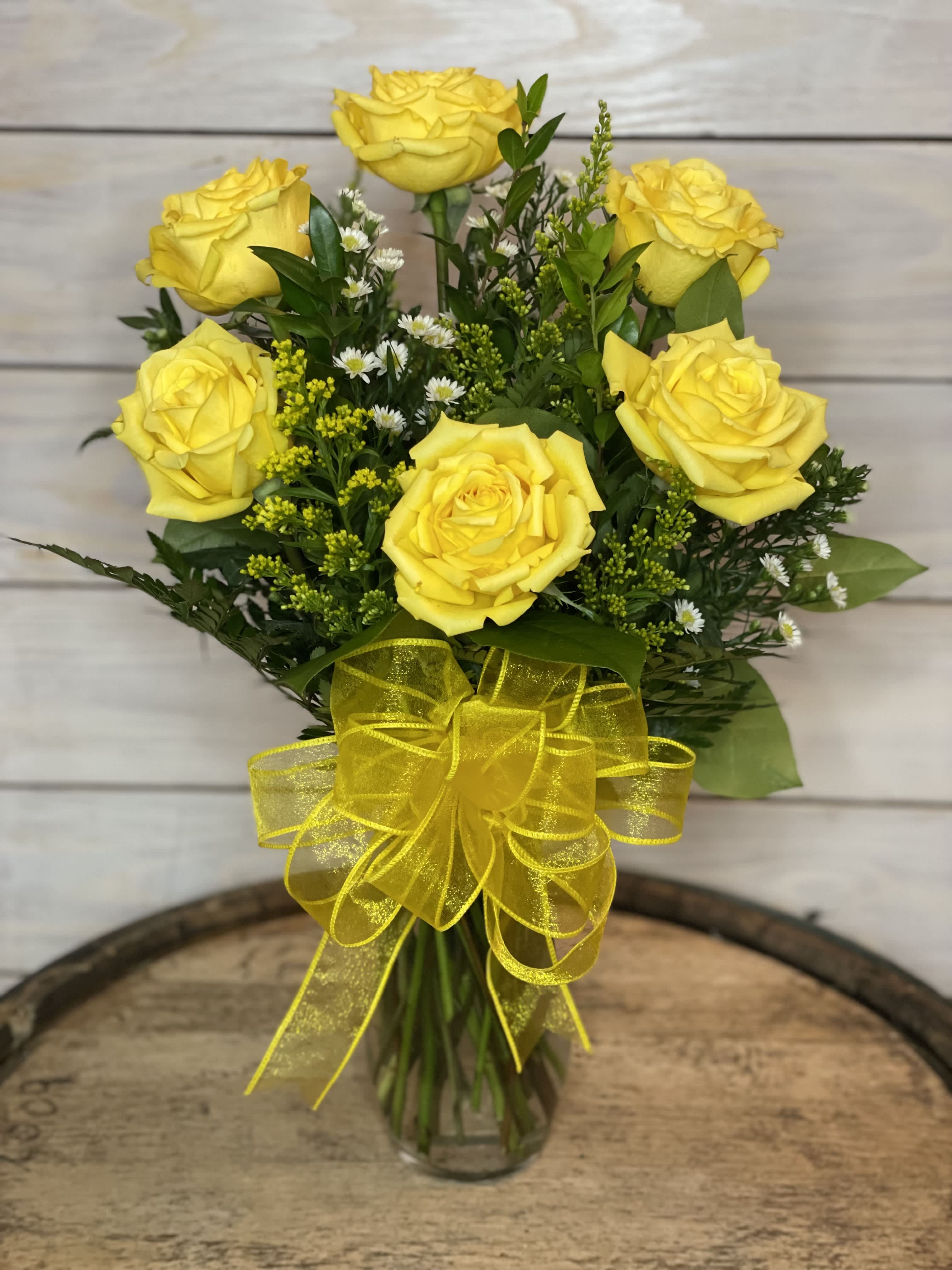 Half Dozen Yellow - 6 Bikini yellow roses arranged in a vase with filler flowers. Yellow is for friendship and sunshine!