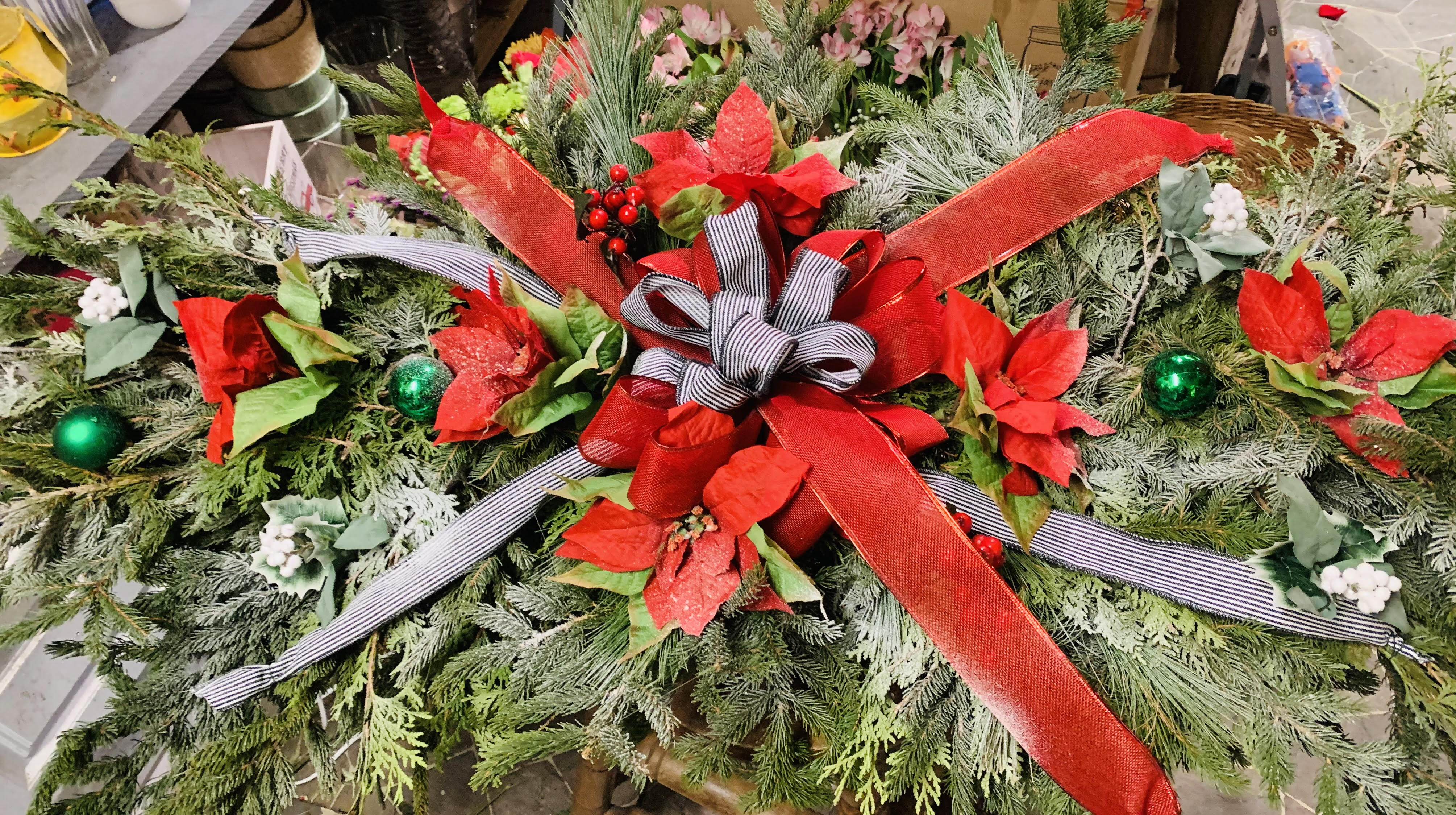 Holiday Grave Blanket  - Our grave blankets are handmade of a variety of fresh greens decorated with seasonal embellishment - Large grave blankets measure appx 5' - ribbon and embellishments vary in color and style