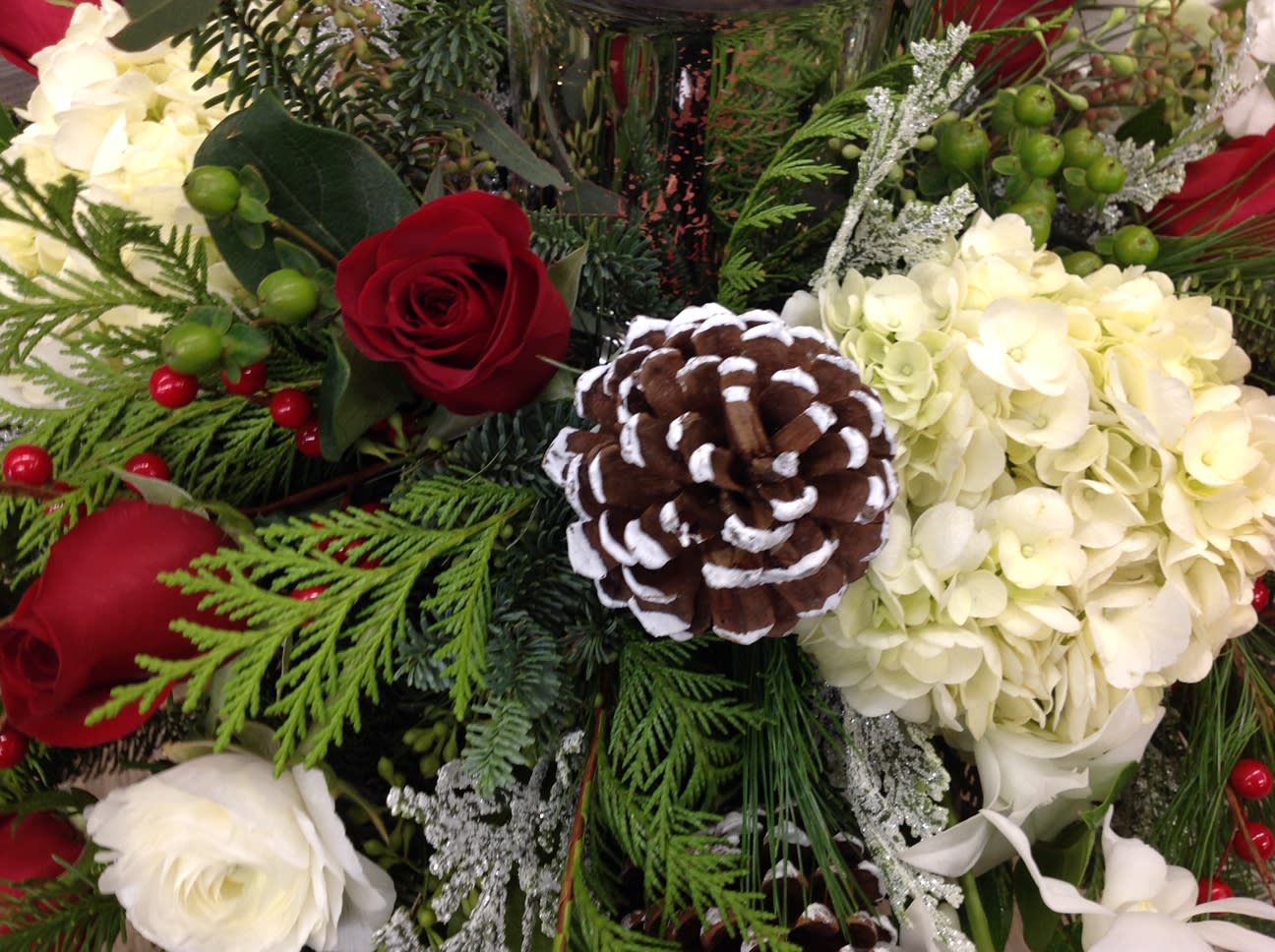 HOLIDAY Custom Arrangement - Designed uniquely for you, this arrangement will surprise whoever you send it to! A perfect gift for anyone who loves flowers.  All arrangements will be created differently by one of our talented designers, so not one arrangement will ever be the same! They may have the same style, appropriate for the holidays but if you have any specific colors or style you would like, just let us know in the SPECIAL INSTRUCTIONS!