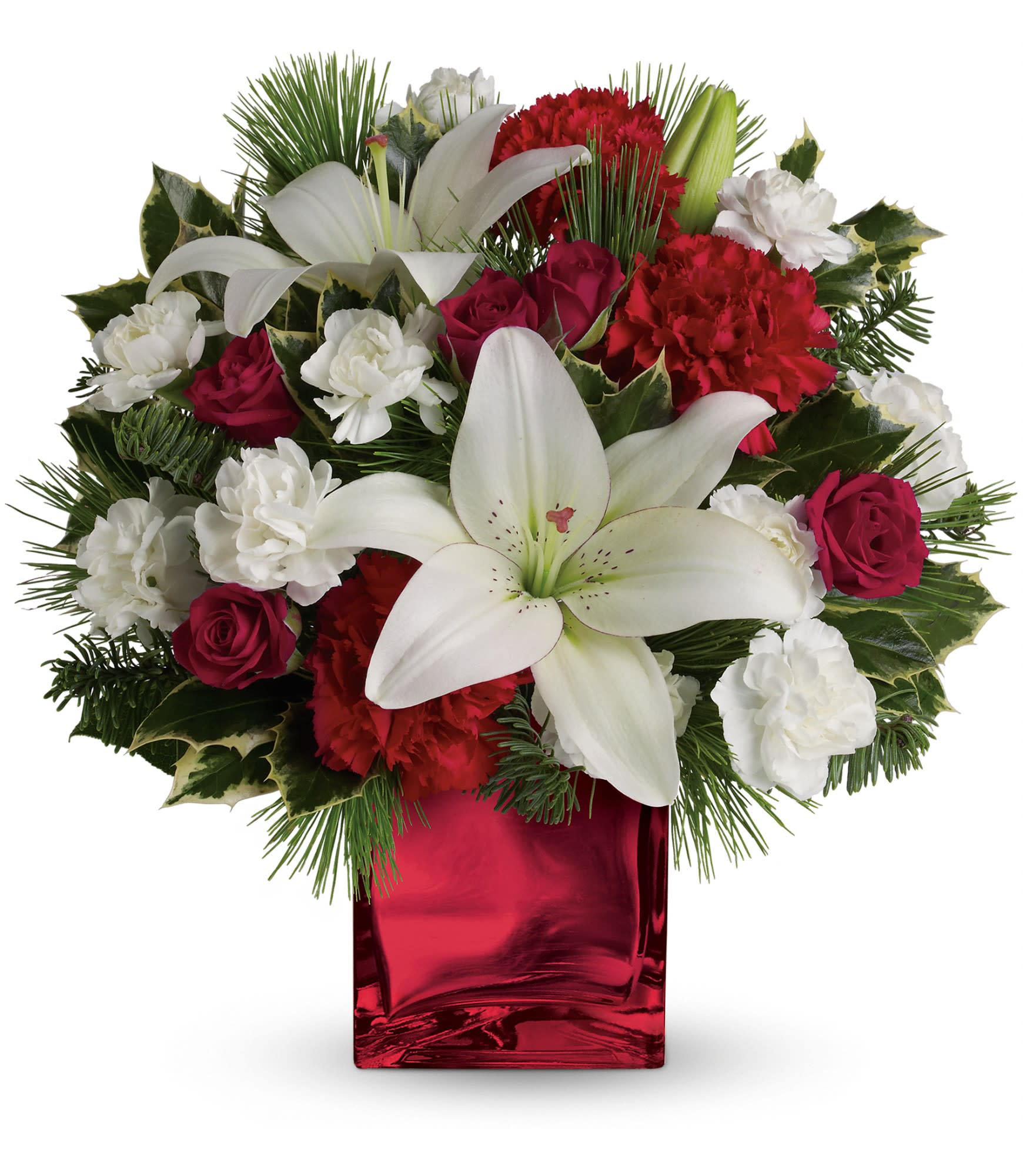 *** allow 3 days notice *** Caroling in the Snow - Red spray roses, white asiatic lilies and red carnations are accented by tips of white pine, noble fir and holly. Delivered in Teleflora's red mirrored cube. Approximately 12 1/2&quot; W x 12 1/2&quot; H