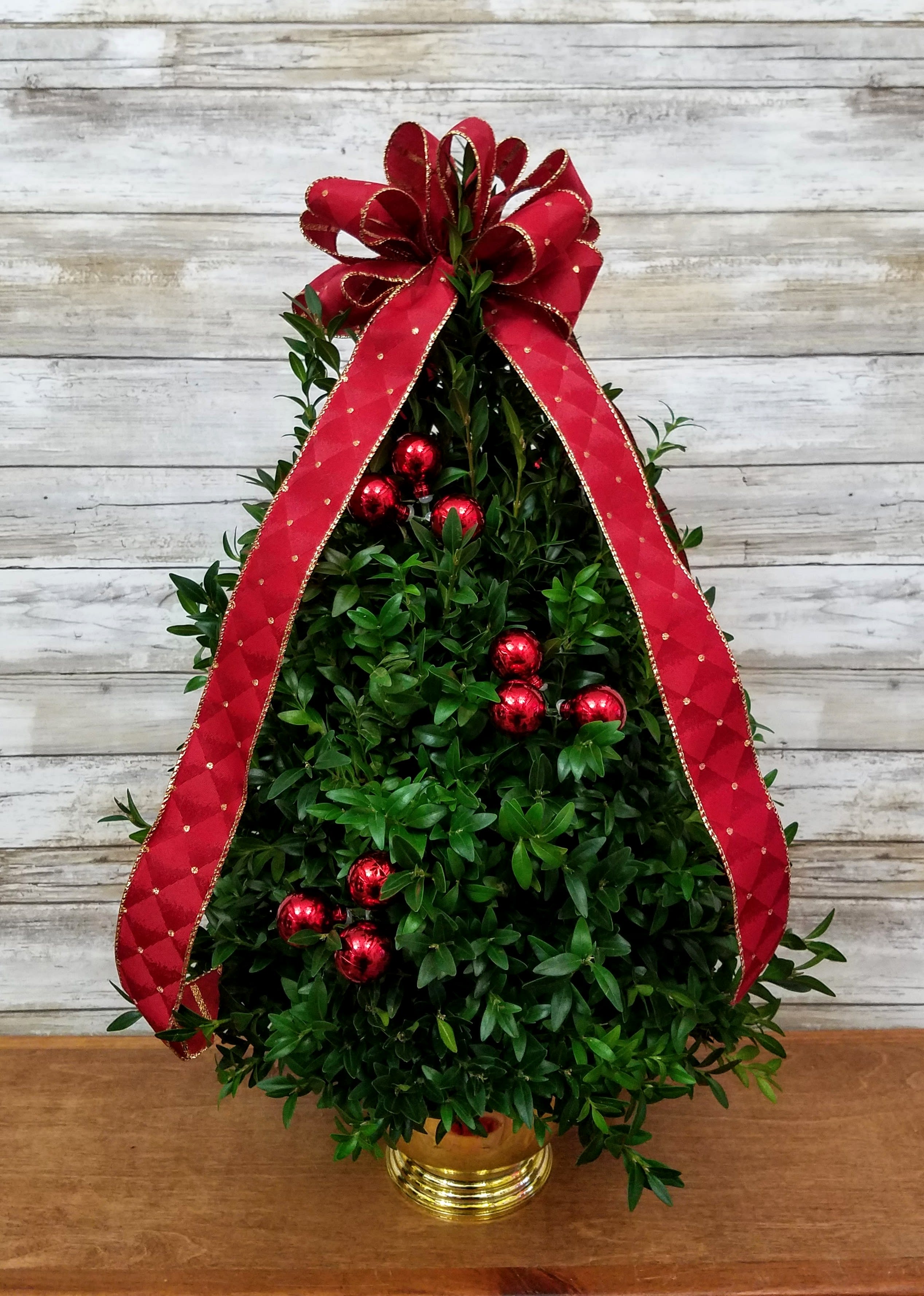 BOXWOOD CHRISTMAS TREE - Beautifully hand assemble and trimmed with sparkling ornaments, fairy lights, and a glittering accents. Let us know any theme/colors you have in mind, this item is customizable!  PLEASE LET US KNOW IF YOU WOULD LIKE A NATURAL OR SPARKLE DESIGN!