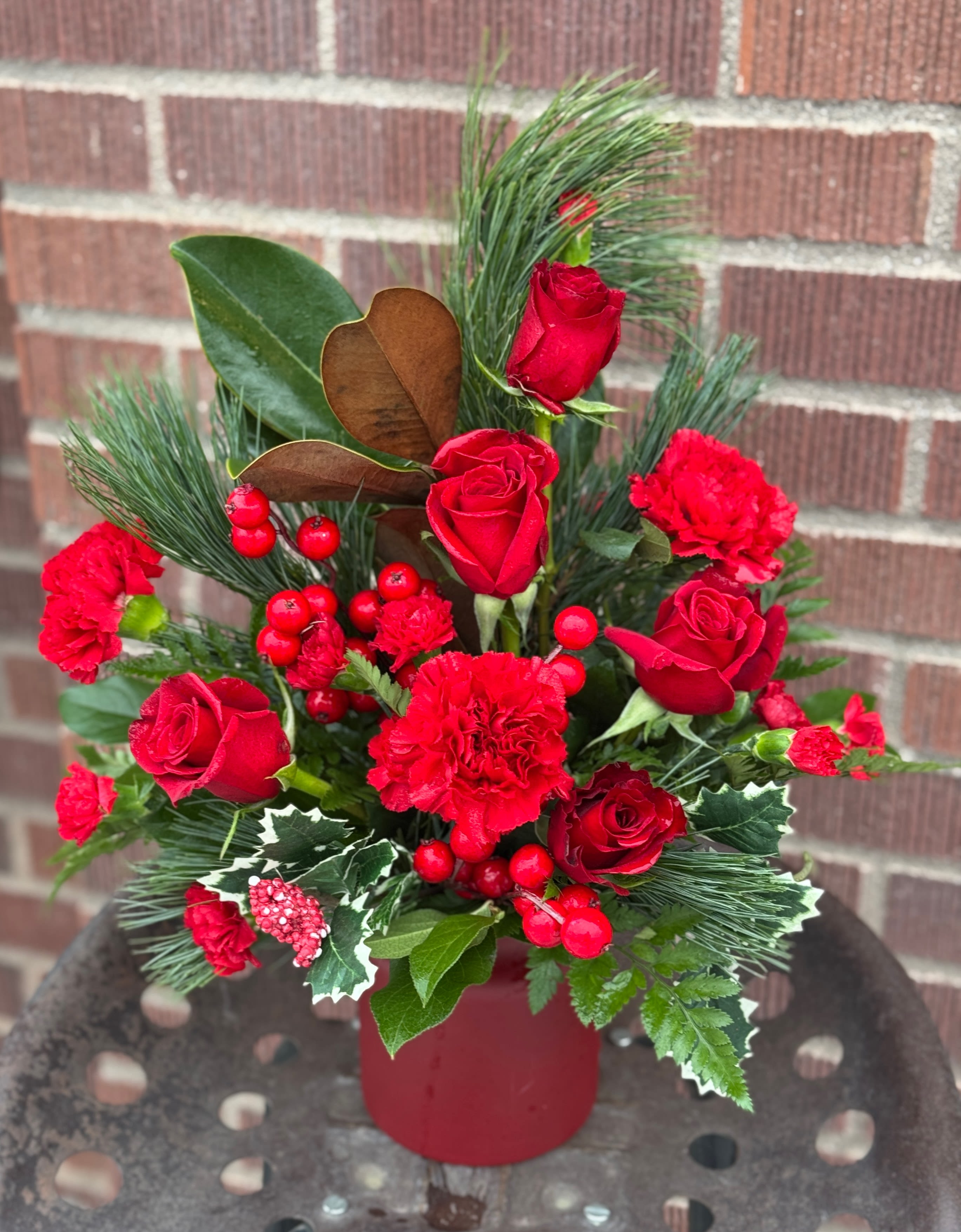 Wild &amp; Wonderful Christmas - Simply unique, this gorgeous green and red design is artfully hand-arranged in a timeless matte red vase.
