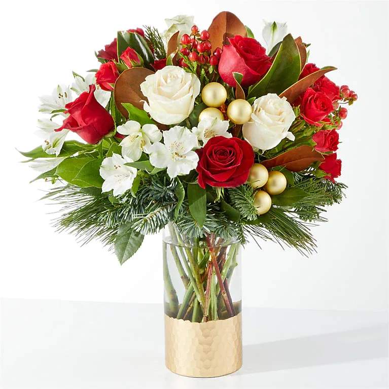 Joy &amp; Jolly Bouquet - Spread joy this holiday season with a shimmering arrangement of roses, alstroemeria, and the incredible scent of seasonal greens.