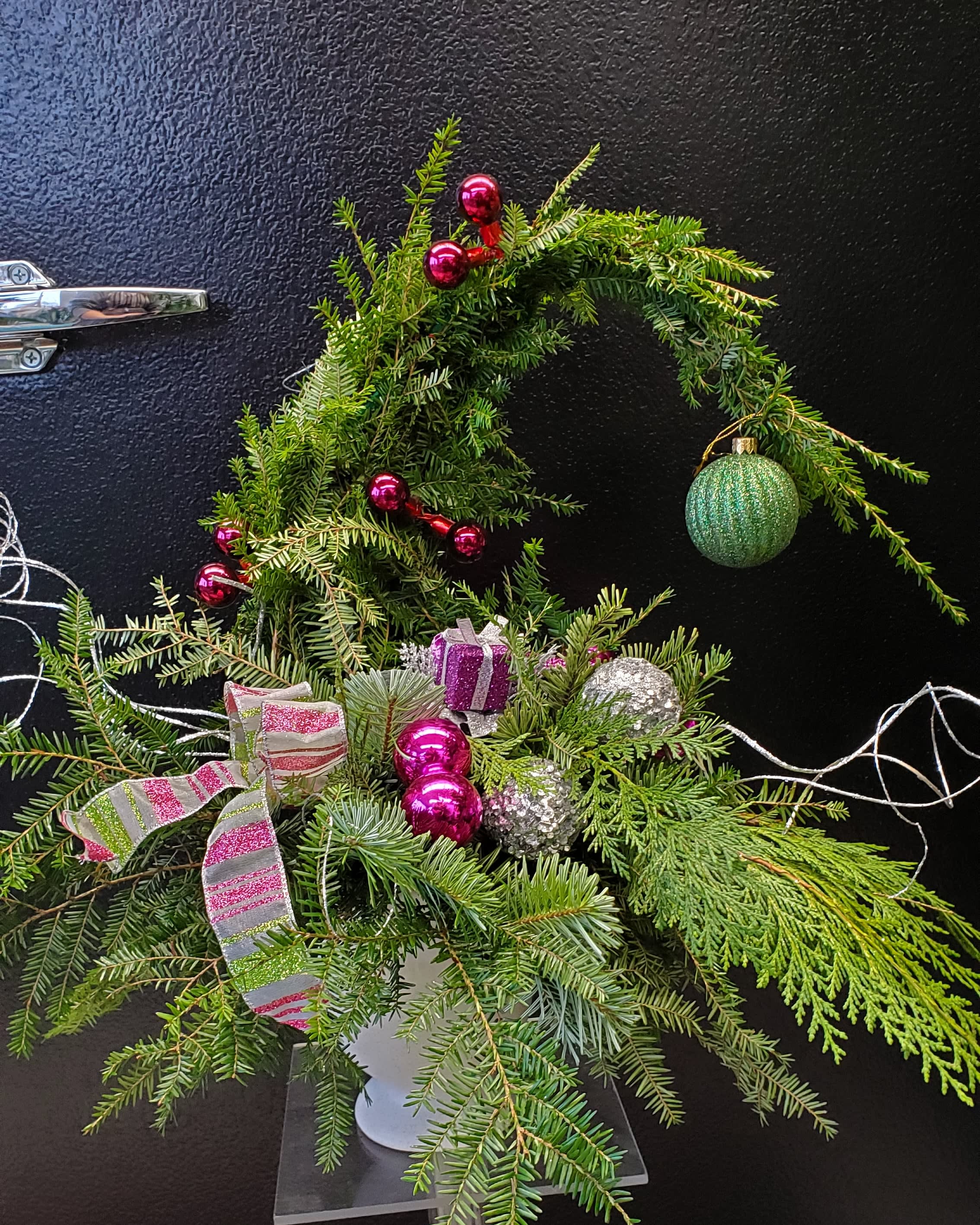 Cricket's Whoville Tree #cgt16 - Dr. Seuss inspired our Designer to create the Whoville Tree for all, including the Grinch! All tree colors will be DESIGNER CHOICE unless other colors are requested in the card section OR you can say "traditional" or "funky" and let us go from there!  Every tree is unique and we cannot guarantee ornaments to be the same as trees pictured, since our ornaments are constantly   This Grinch tree stands approx. 12-14 inches tall. Unless otherwise requested, colors are designer's choice &amp; won't necessarily match what is shown online. If you would like a specific color combination, please leave a note upon ordering.  Please note that we are unable to always guarantee exact ornaments as our stock is constantly changing  The small (18") Grinch makes a divine hostess gift. The small (18") and medium (24") are great as corporate gifts. And the large (30") ….. is the perfect mid size Christmas tree! Each is one of a kind decorated.  Great gift that lasts the whole holidays season.  Watering required twice a week to keep your Whooville tree as fresh as when you got it!!