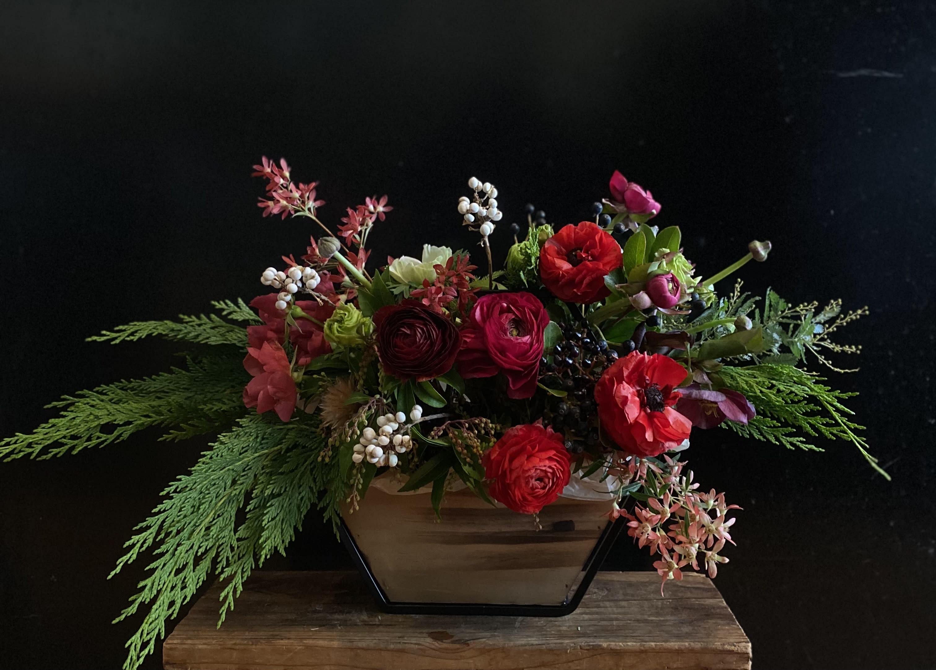 Falderol!, a Centerpiece - Something for the Holidays. Bursting out of a lovely architectural wood and metal vase, versatile enough to hang on a wall our adorn the center of your table, Falderol manages to be bright and warm and lovely enough to thaw even the scrooggiest of Scrooges. Place Falderol on your door or table today or Yule be sorry!