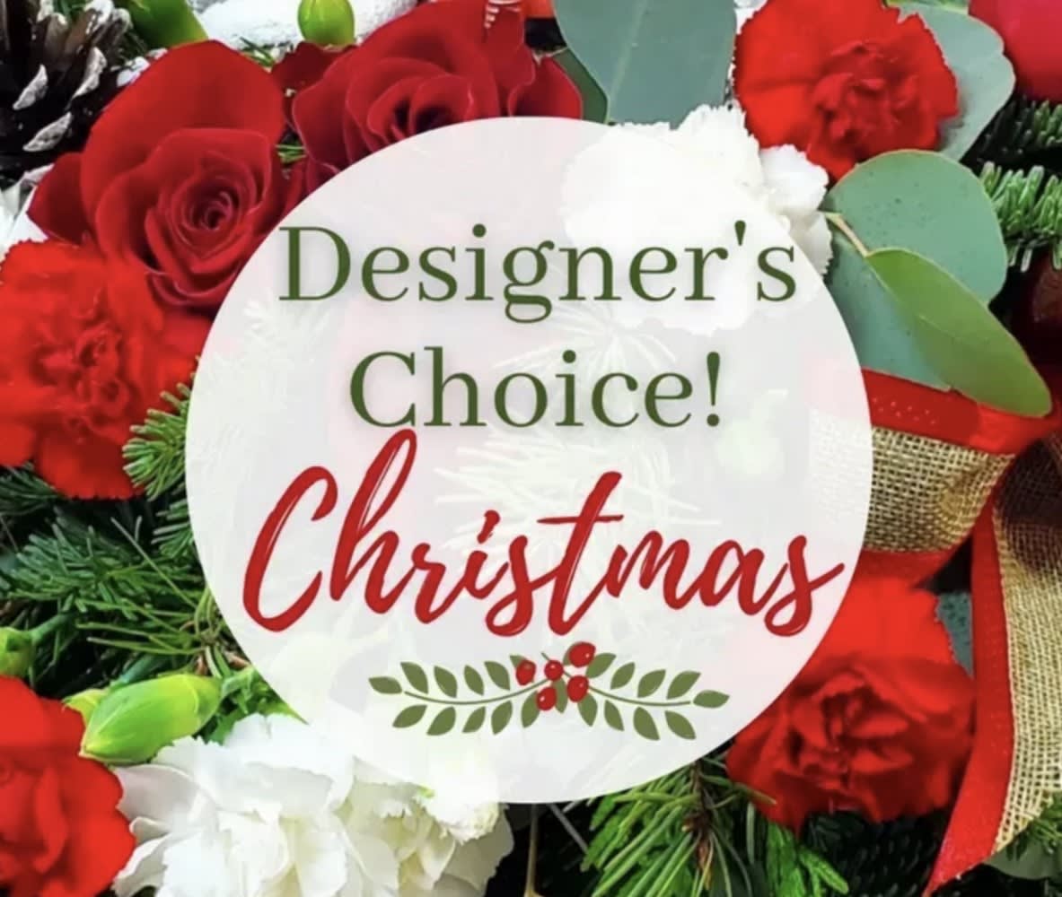 Designer's Choice Christmas - Let our designer's come up with something fun and festive to capture all the joy of the holiday season with red, green and white blooms in a vase or container.  If this arrangement needs to be pet friendly please specify in the special instructions. Thanks!