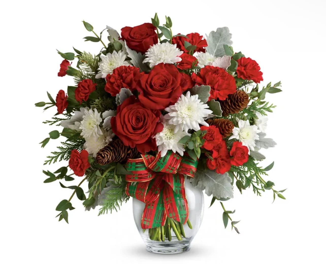 Red Holiday Joy - 'Tis the season with this holiday arrangement full of Christmas blooms! This beautiful arrangement will brighten up any room or office. Created with holiday flowers including red roses, red carnations and white cushion mums all in a glass vase wrapped with a holiday-themed bouquet.  PLEASE NOTE: Florist reserves the right to make modifications to the design based on seasonality and accessibility of blooms and vases. Any modifications made will honor the palette, intent, and feeling of the pictured design. Contact floral designer directly with any specifications or concerns.