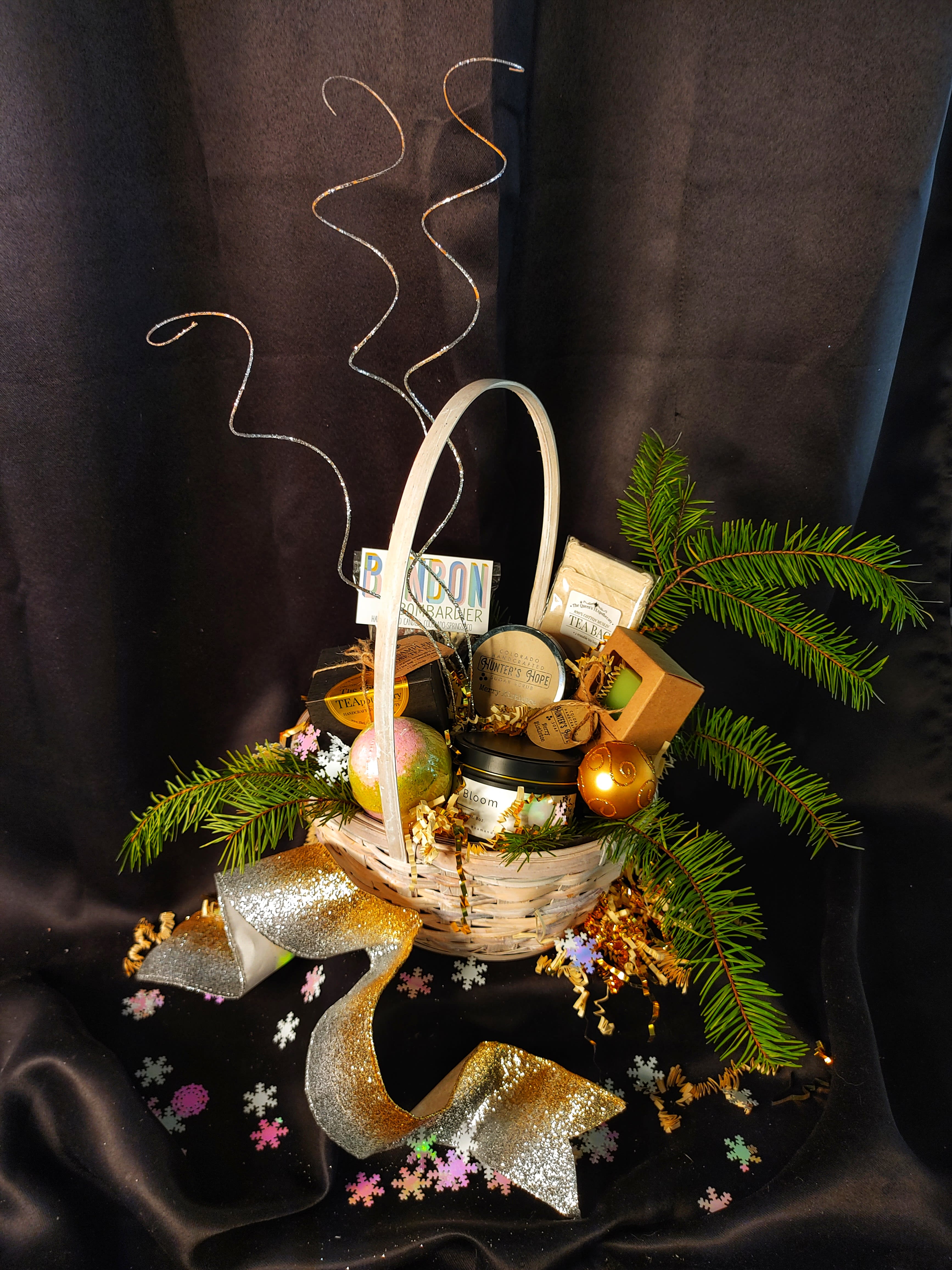 Santa's Little Helper - Even the elves need some TLC. Pamper your favorite person with this basket filled with local treats and spa products. Ranging from candles, teas, chocolates and bath bombs. Slow down and smell the scents of the season!