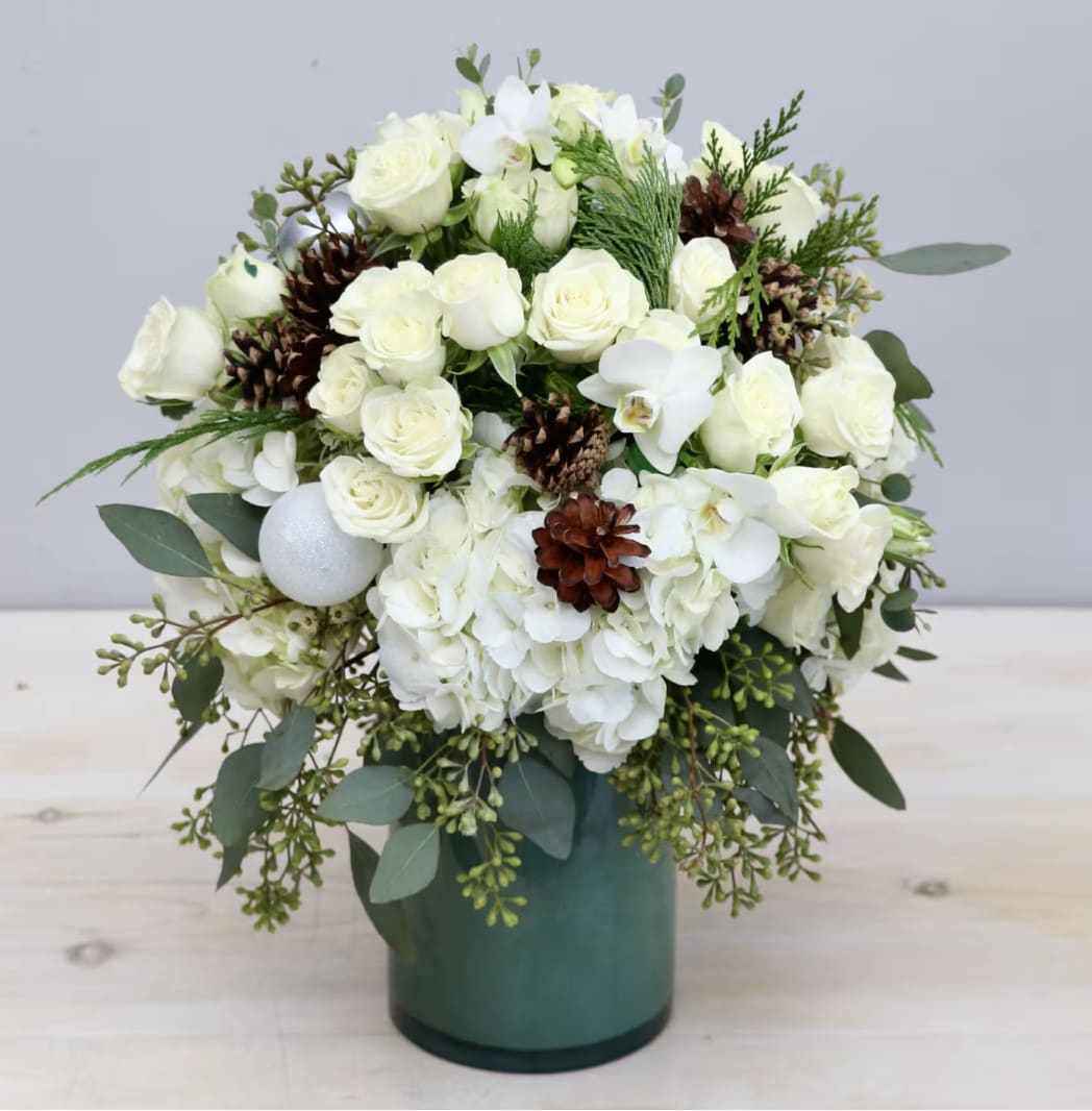Winter Orchid - West Hollywood Flowers  - This beautiful arrangement includes our favorite hydrangeas, orchids, and fragrant greens. 