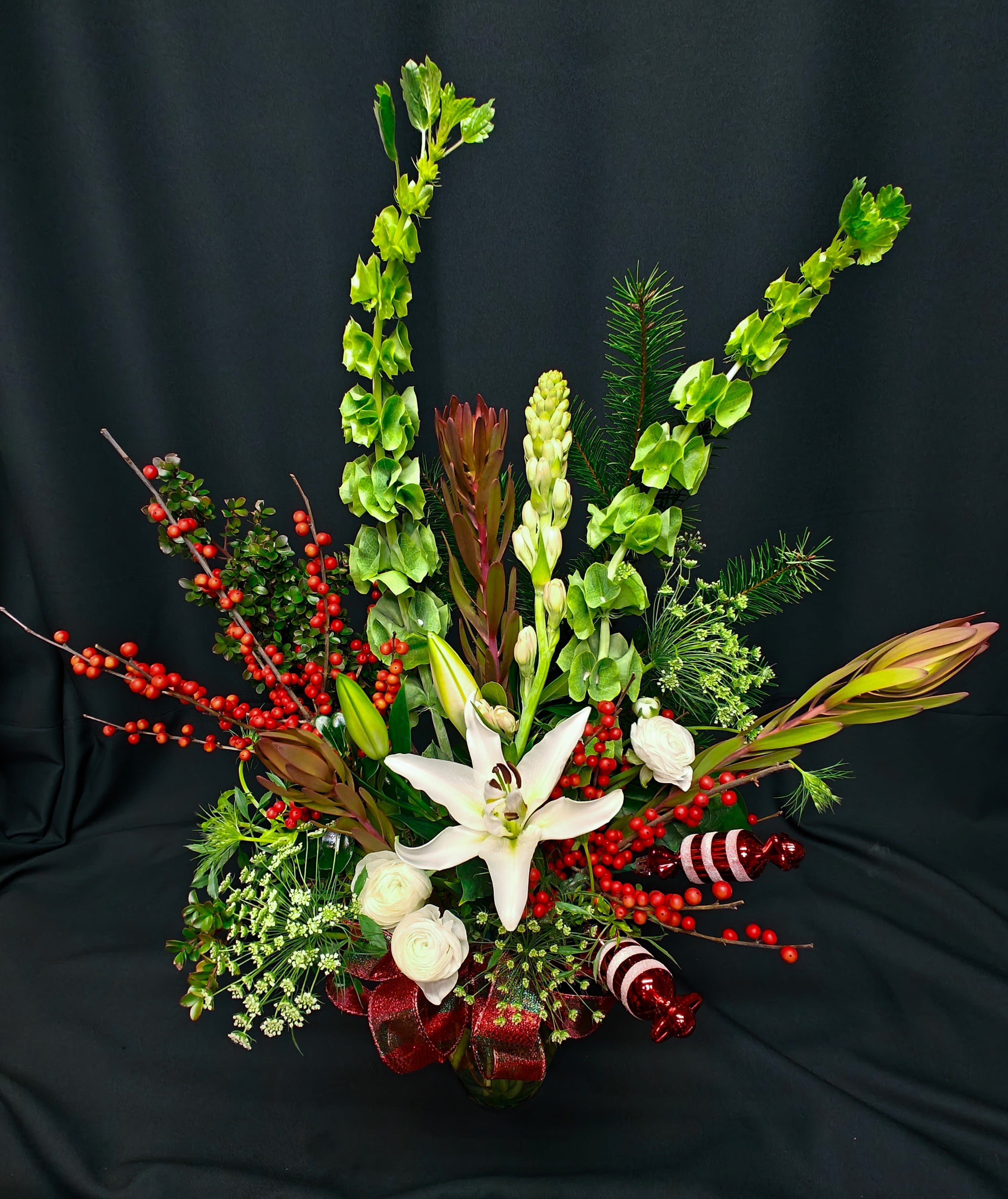 Holiday Berry Mix - Medium tall mixed vase to include best of seasonal selection, which may vary, and a fun novelty holiday accent. Beautiful host gift to send ahead to your next holiday event or take with you and make a jolly entrance :) 