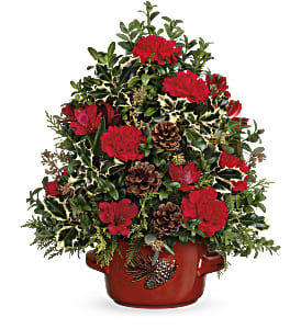 Holly &amp; Pinecones Tree - Nothing's more festive than a vintage stoneware serving dish topped with a lush Christmas tree of holly and blooms! Red carnations and red alstroemeria are accented with English boxwood, seeded eucalyptus, cedar and green holly. Delivered in Teleflora's Vintage Stoneware Bowl. Approximately 15 1/2&quot; W x 18 1/4&quot; H 
