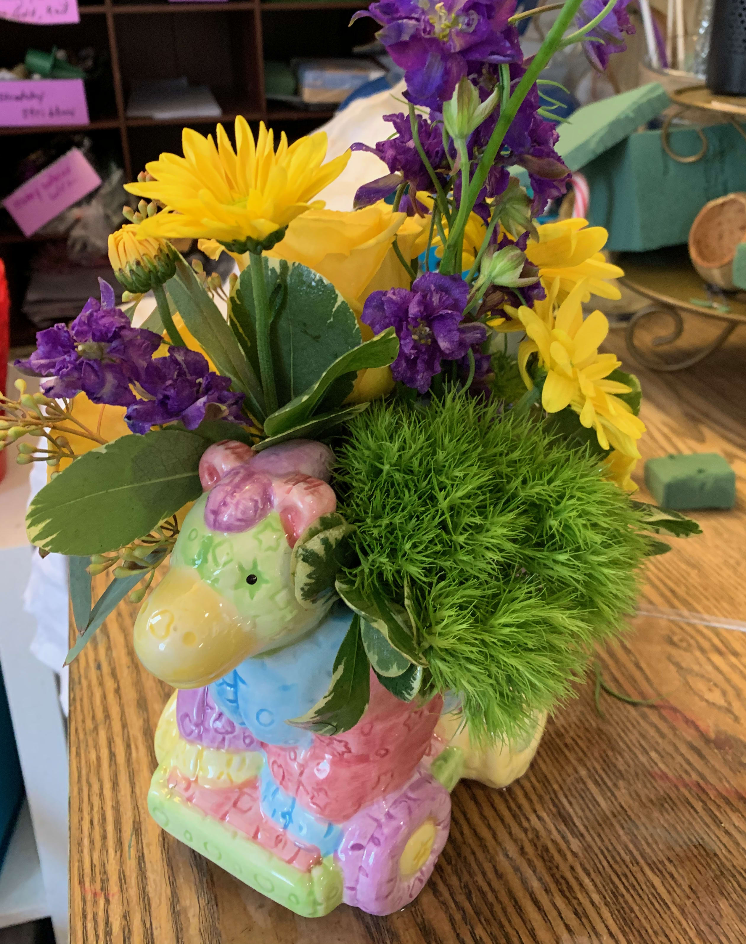 Vintage Container - Vintage arrangement One of our favorite custom item is a planter or dish garden created in a one of a kind, vintage container. Indicate in your special instructions the occasion and if there is a particular “thing” the recipient is into. Its fun, special and you will find nothing like it. Florist may communicate with you further via email to get the order exactly right. 