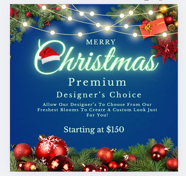 Premium Christmas Designer's Choice - Allow our designer's to choose from our freshest seasonal blooms and create a look just for you!  Once your order is placed a representative from Spring Flower Market will contact you to discuss vase, style and shape to ensure your recipient receives the perfect, seasonal bouquet.