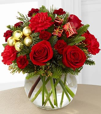 FTD Holiday Gold Bouquet - Traditional woodsy pine and crimson roses make this seasonal bouquet perfect for any occasion! gold accents will brighten the day of your loved one!