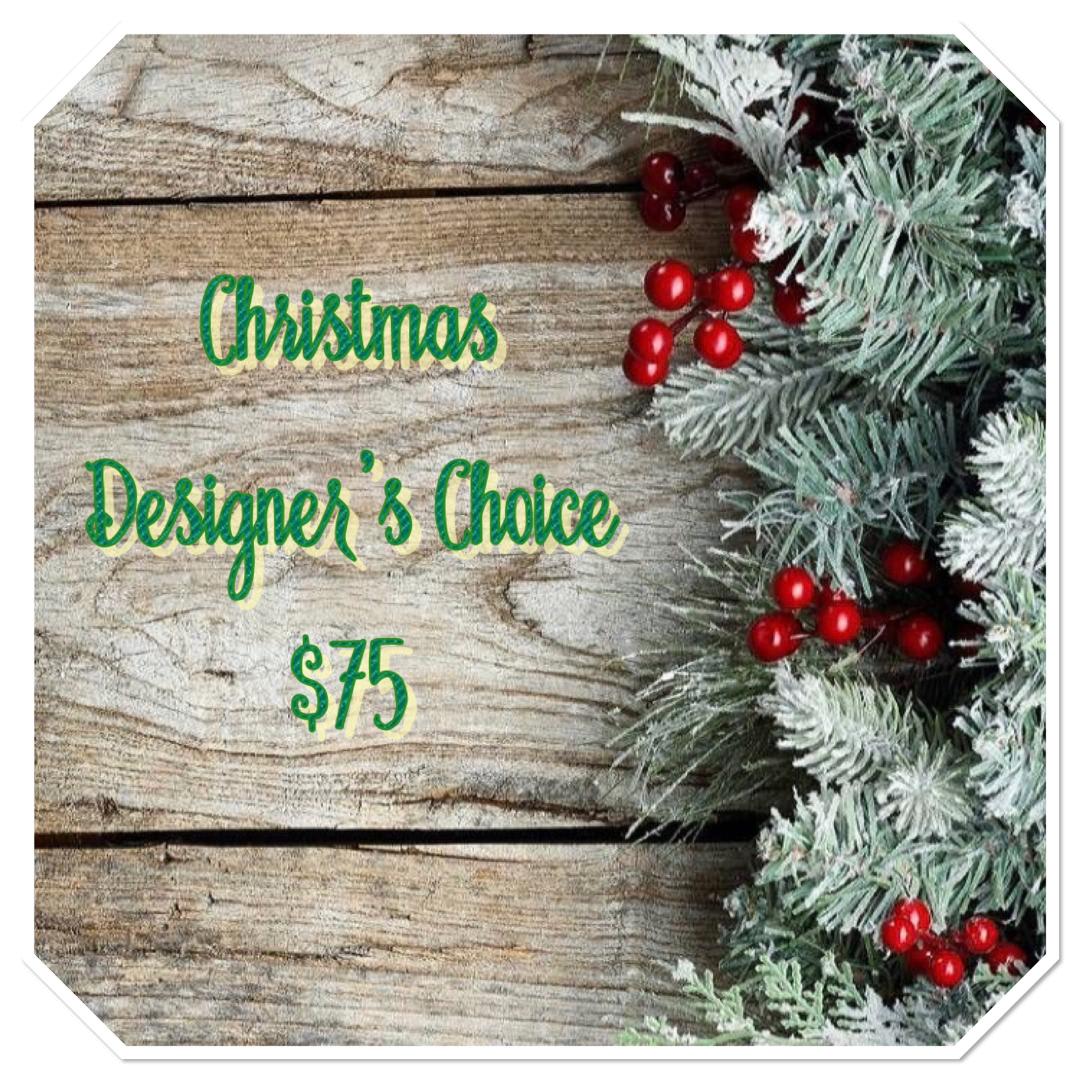 Designer's Choice Christmas Flowers - We will handpick beautiful flowers for this holiday season. Feel free to specify centerpiece or holiday arrangement and we will take it from there. Most designs will include pine cones, ribbon, and evergreens, along with the best selection of red, white and cream colored flowers. (This design may be all one color)