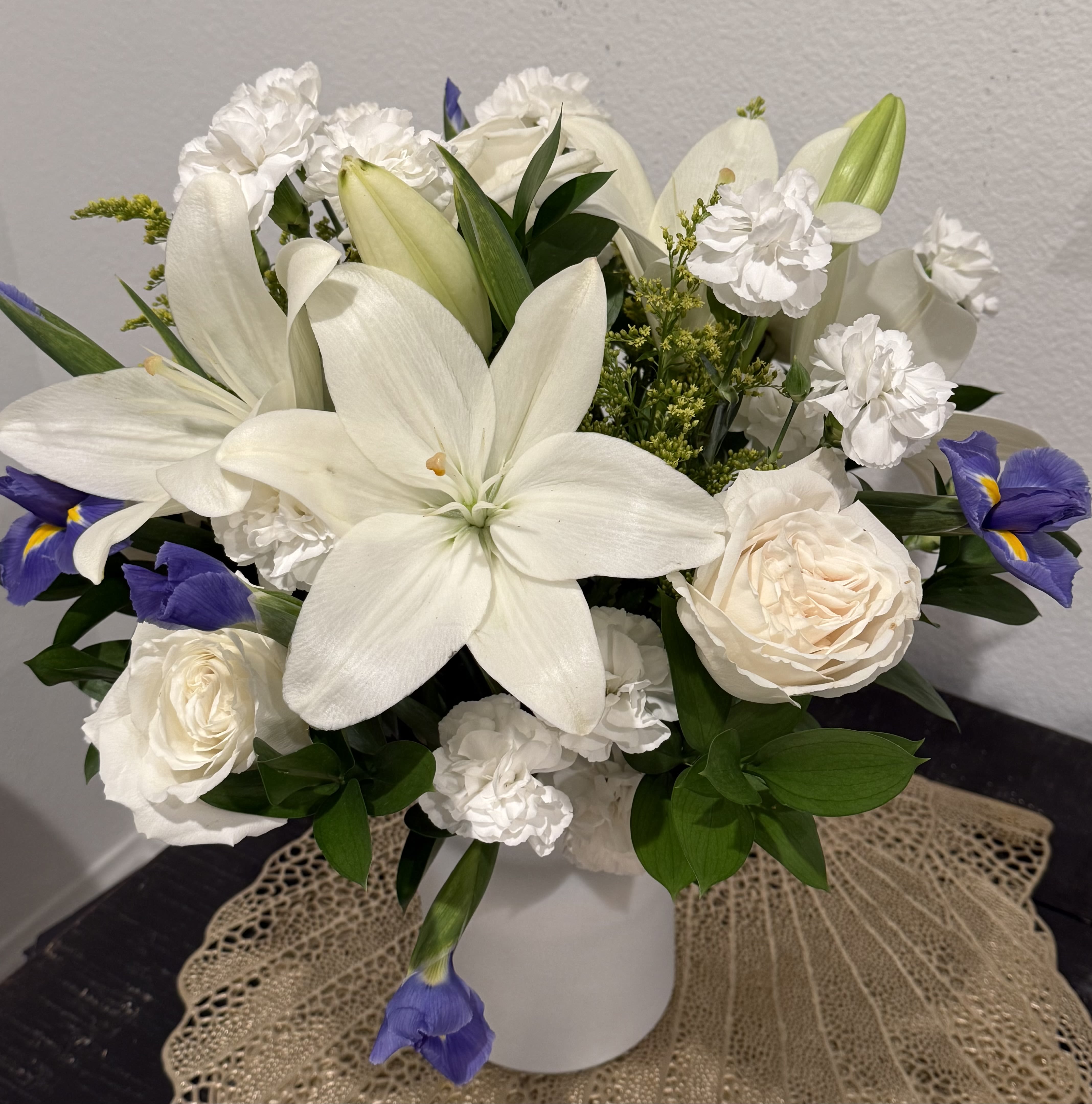 Sympathy-designers choice - Flower arrangement made with in stock flowers to honor your loved one.  Need more information on in stock flowers please call the shop 8958449079