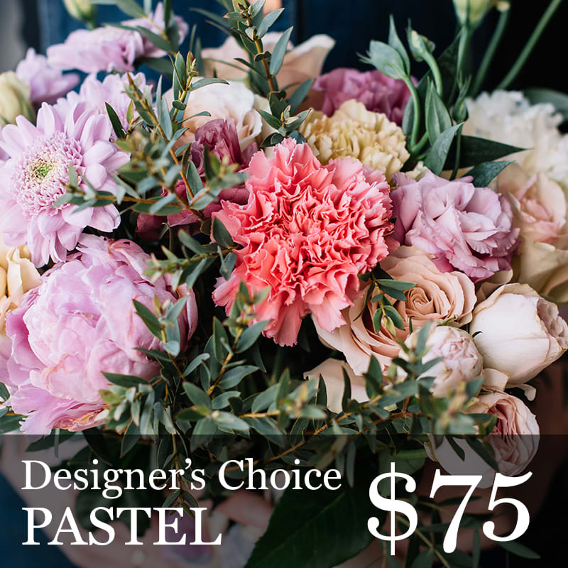 Designer Choice Pastel Colors - A little surprise for you and the recipient, let us design a beautiful mix of fresh flowers in pastel colors. Container and flowers will depend on the occasion noted on the card. We will hand pick and hand deliver flowers that will turn heads.   (photo is an example of pastel colorS)