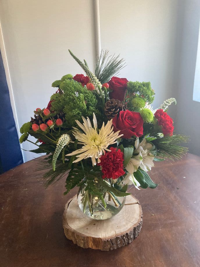 jingle bells - clear vase filled with festive red, green and white flowers