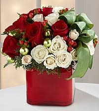 Snowflakes from santa  floral 234509 - Lovely floral with red and white florals.  Each floral is unique as we do not mass produce our florals so each one is special and artistic.  