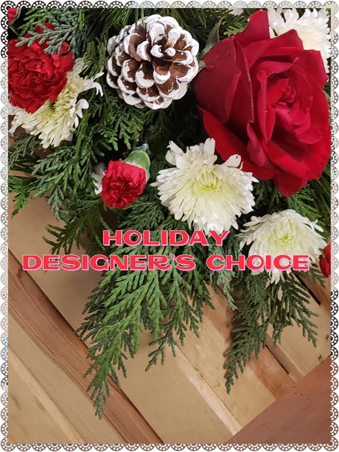 Holiday Designers Choice  - Designer choice Holiday themed! Give Alexandria's Flowers creative freedom and one of our top designers will design a custom, one-of-a-kind arrangement personally for you. This design can be in a vase a cube  glass or any container seasonal design, using the best premium flowers available, perfect for any holiday. You may suggest Tall or a long and low center piece in the special instructions.  
