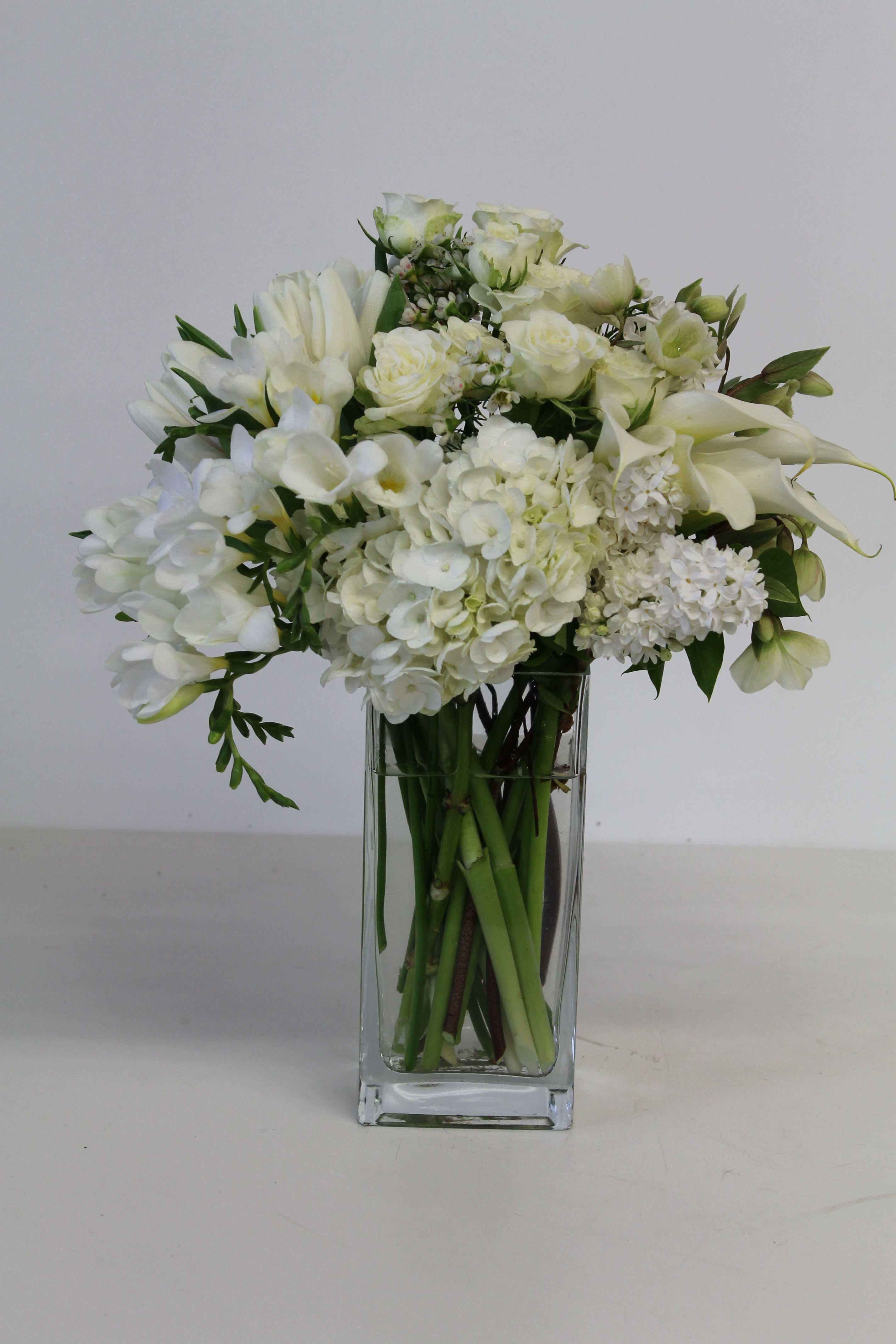 As Pure as your heart - Lilac, Freesia, Calla Lily, Hydrangea, Spray Rose, Wax Flower, Tulips